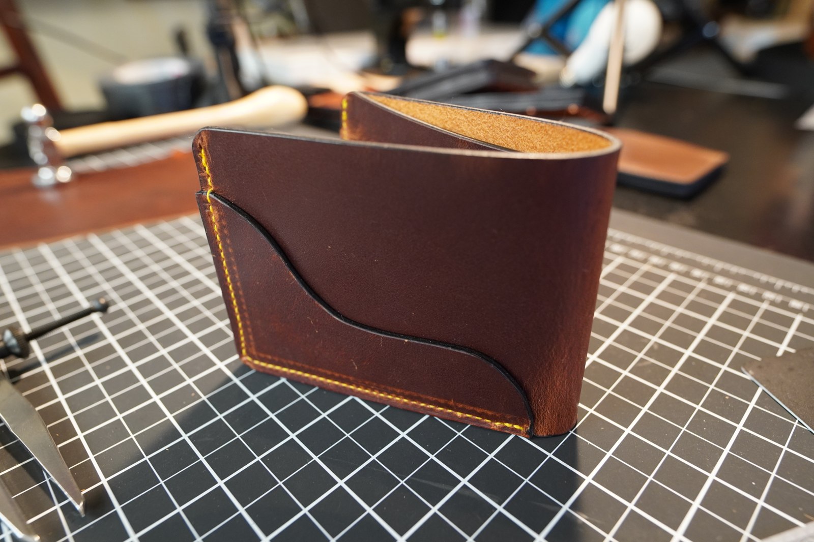 Ragnar leather bifold with contrasting hand stitching