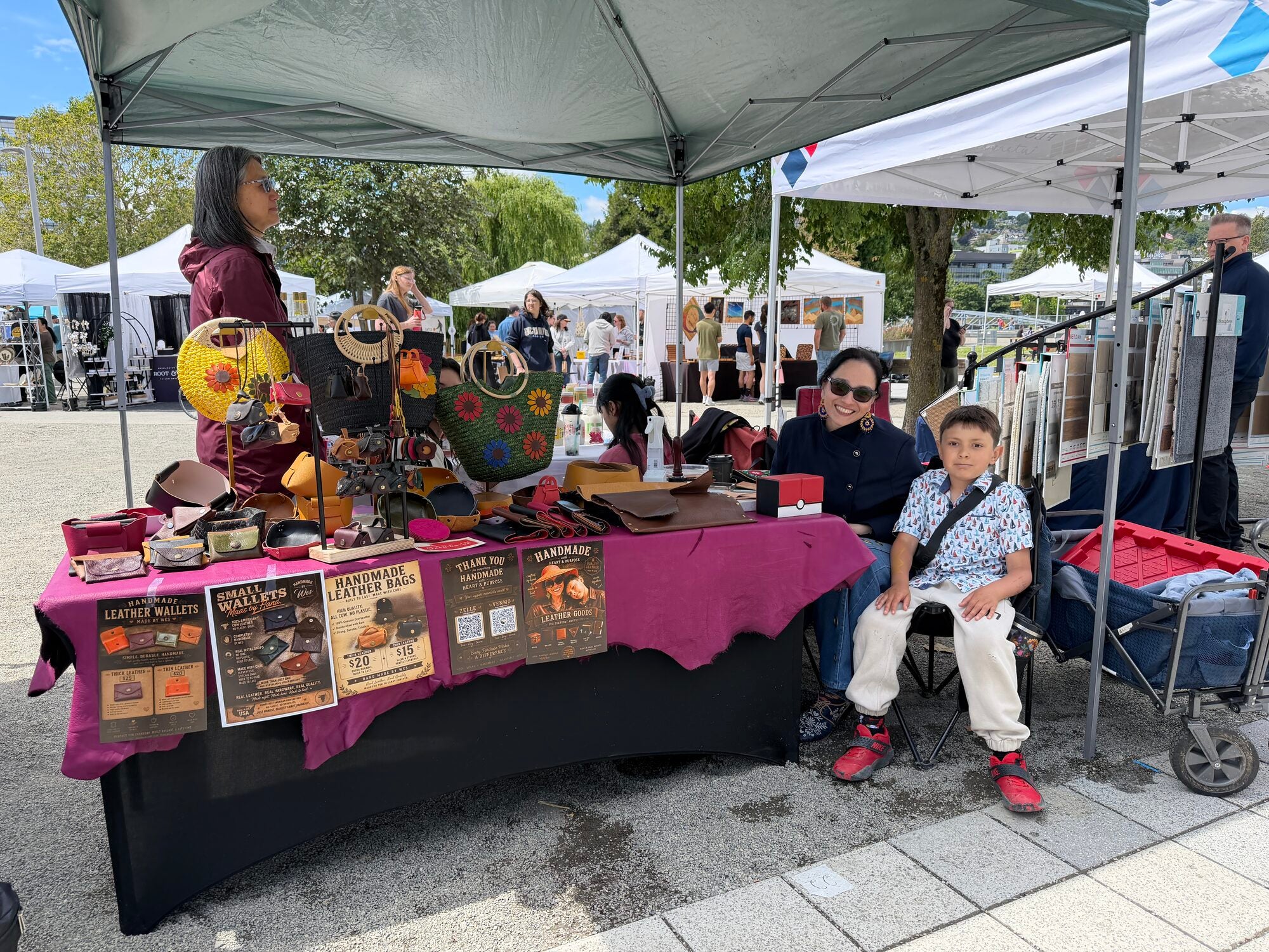 The And Her Son Co. booth at the farmers market